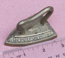 Decorated Miniature Brass Iron